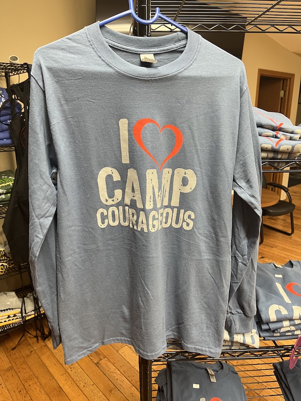 Slate blue long-sleeved t-shirt with "I "heart" Camp Courageous" graphic.