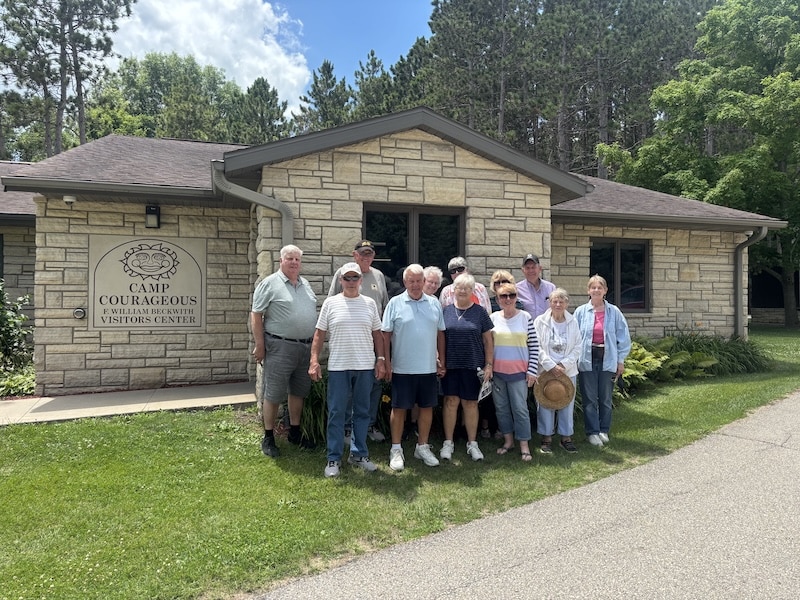 Sue & David Burrack Organized A Tour Of Camp Courageous For Twelve Friends From The Strawberry Point/Arlington Area