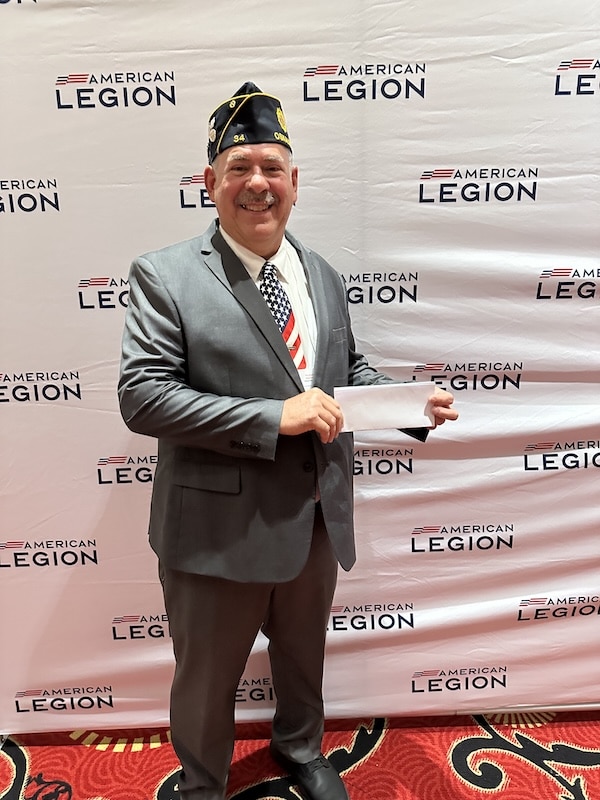 American Legion of Iowa Foundation President, Steven Dixon, Presents Camp For New Totally Remodeled South Cabin.